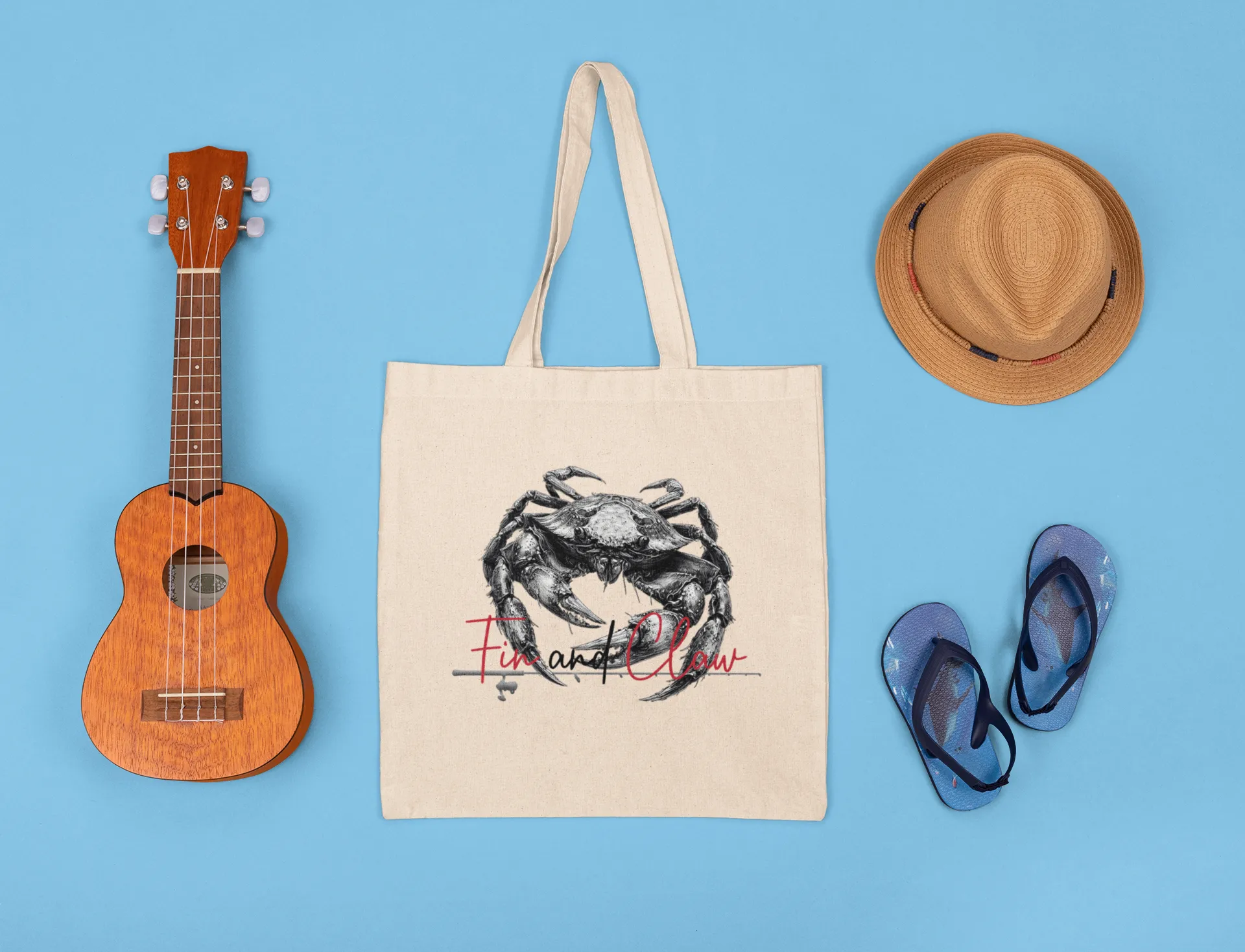 Canvas tote bag featuring the Fin and Claw Dungeness Crab design