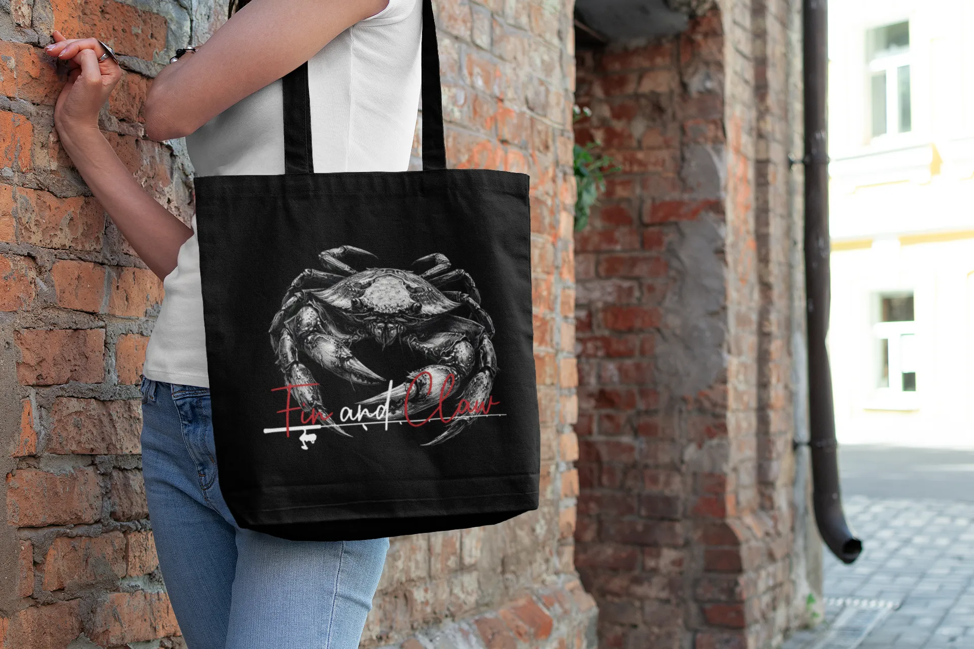 Canvas tote bag featuring the Fin and Claw Dungeness Crab design