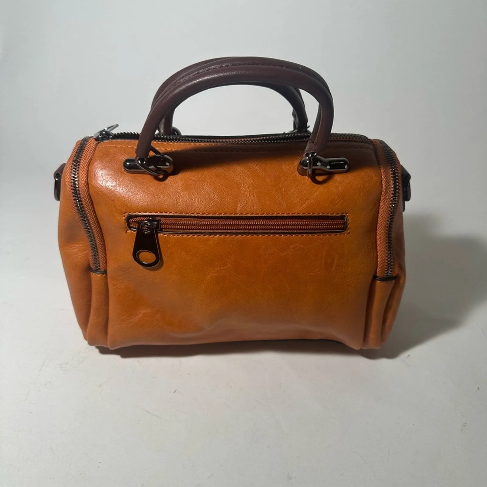 Elegant Tan and Brown Leather Satchel with Tassel Detail