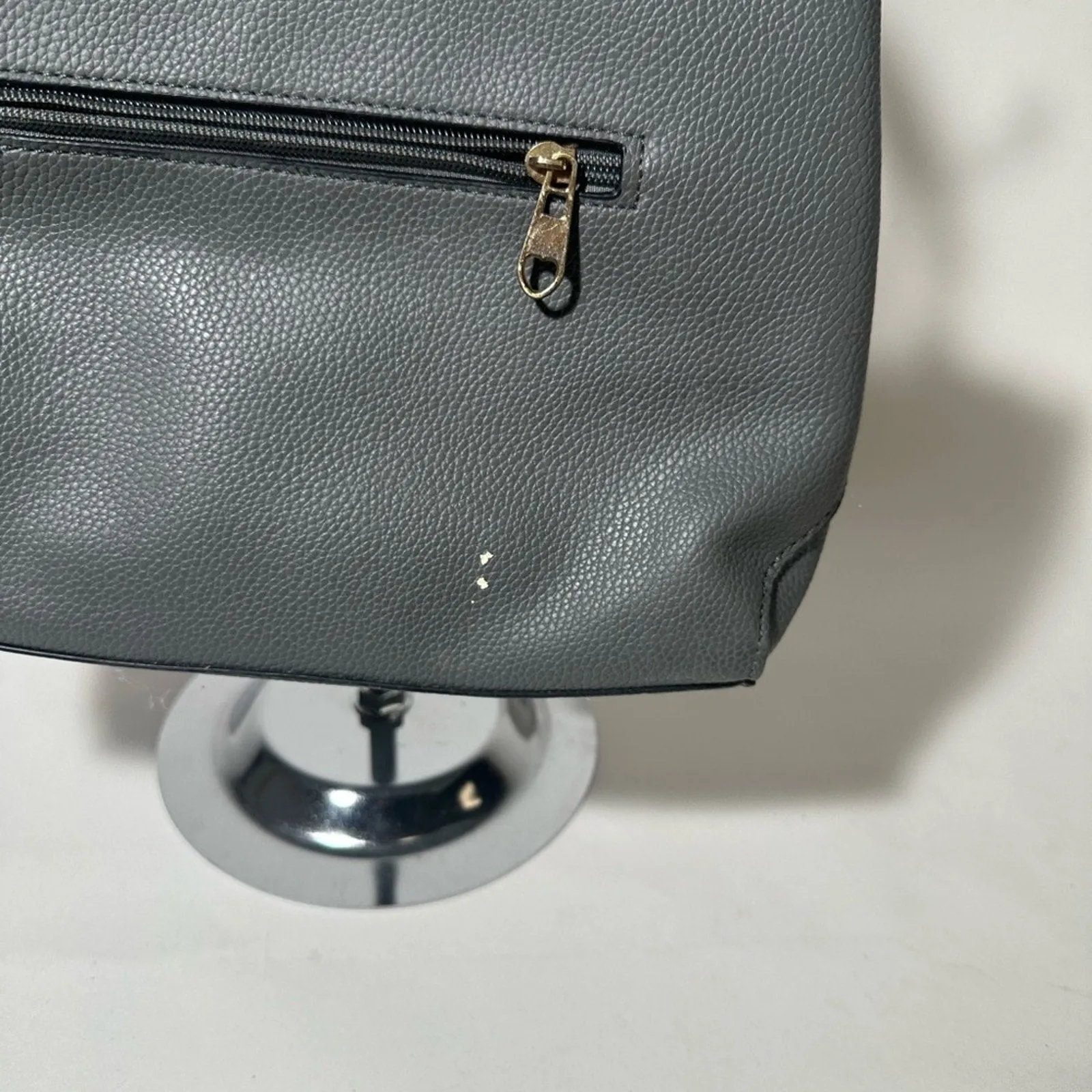 Gray Satchel with Structured Design and Gold Accents
