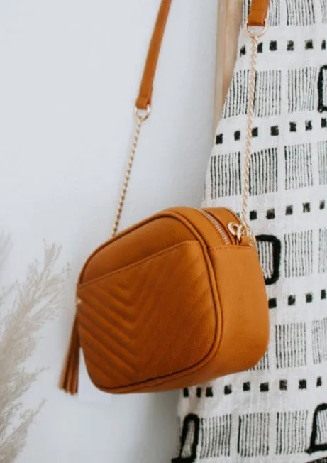 In a Tassel Crossbody Bag