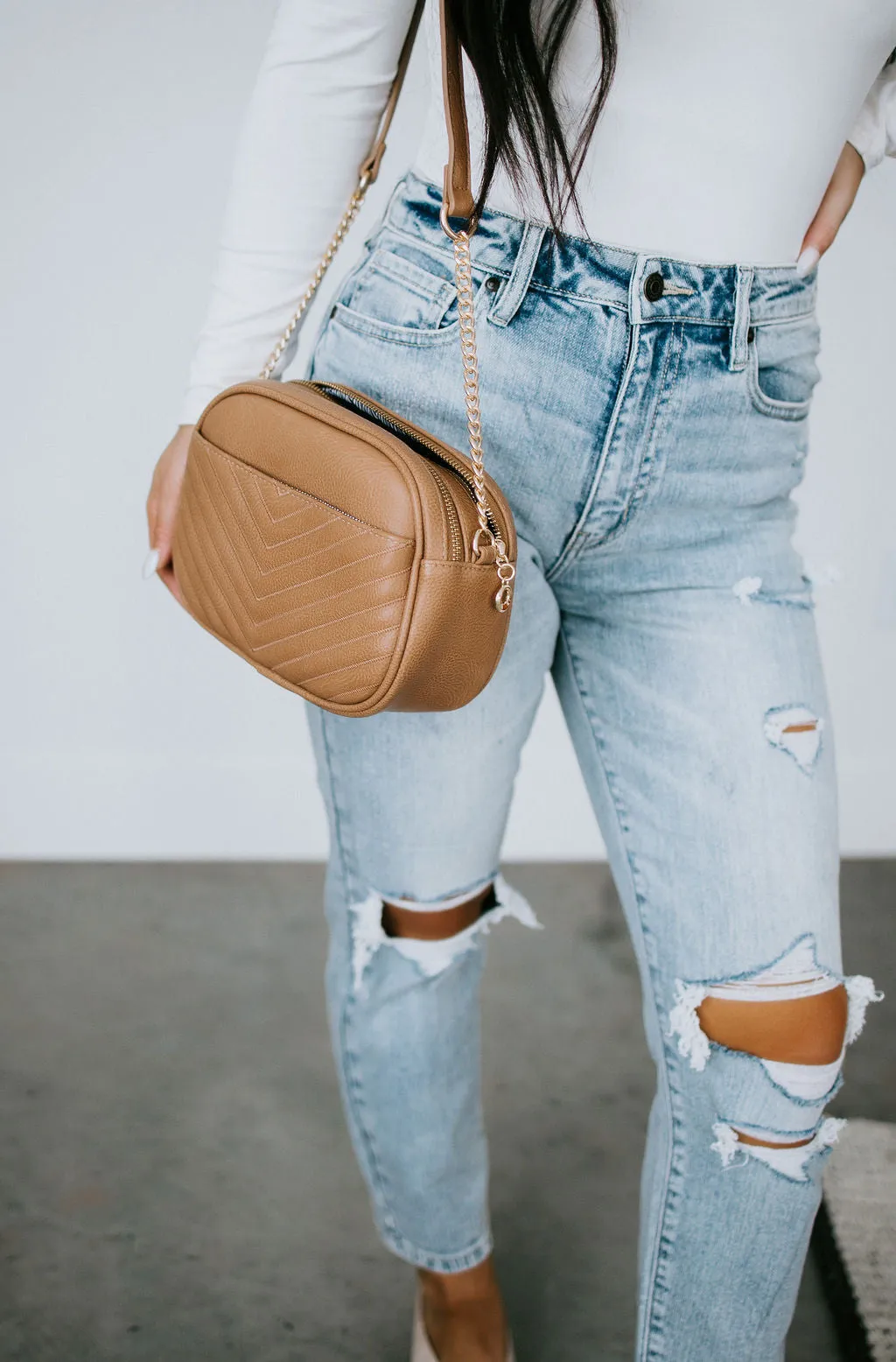 In a Tassel Crossbody Bag