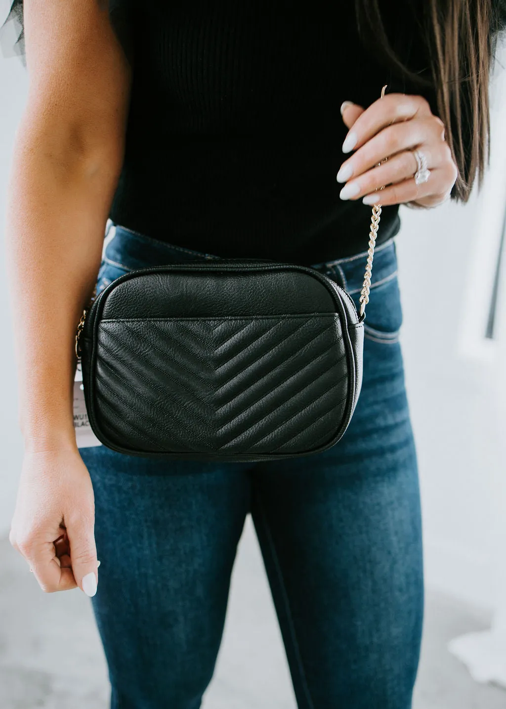 In a Tassel Crossbody Bag